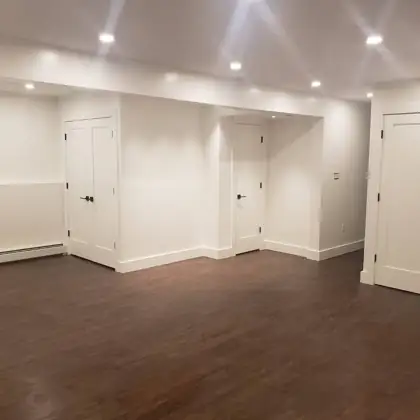 Dark luxury vinyl plank flooring installed in a home, Rockland County NY