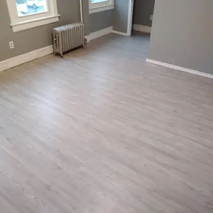 Gray luxury vinyl plank flooring installed in a home, Rockland County NY