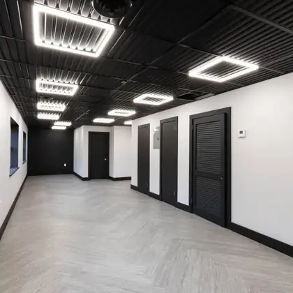 Gray patterned carpet tile installed in an office corridor, Rockland County NY