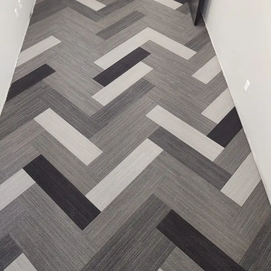 Geometric patterned carpet tile installed in a commercial office corridor, Rockland County NY