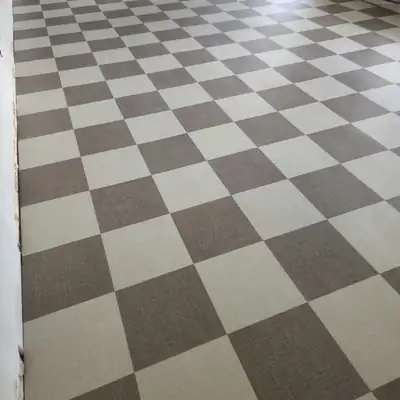Checkerboard carpet tile installed in an office