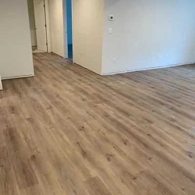 Light oak luxury vinyl plank installed in a new home