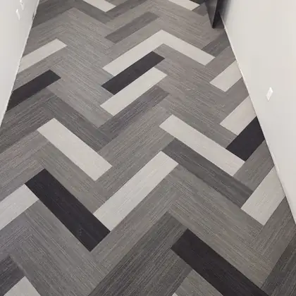 Geometric patterned carpet tile installed in an office corridor, Rockland County NY